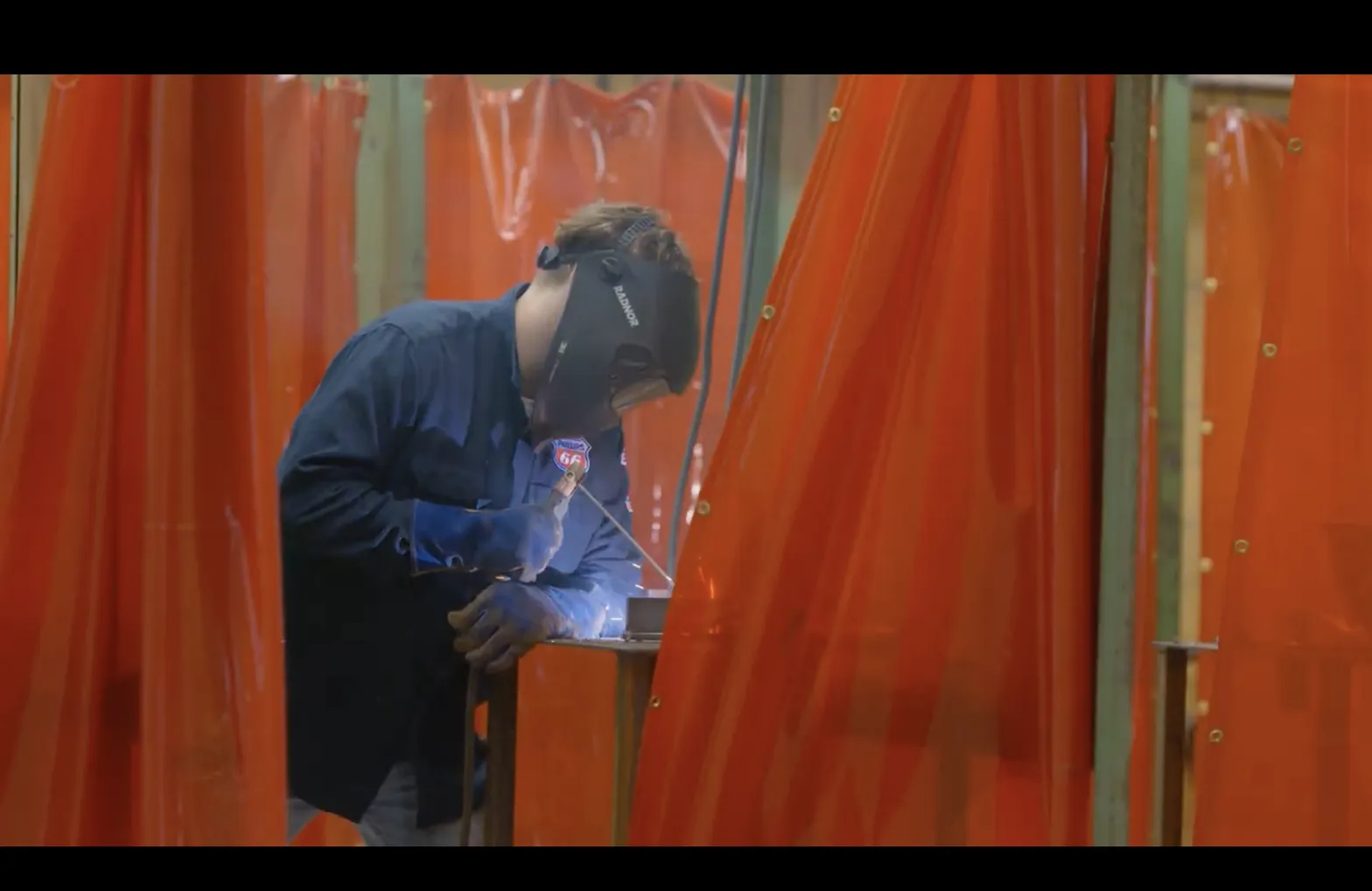 Student practicing welding in a career and technical education class